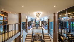 MS Annika atrium lobby with reception, boutique and shore excursion office